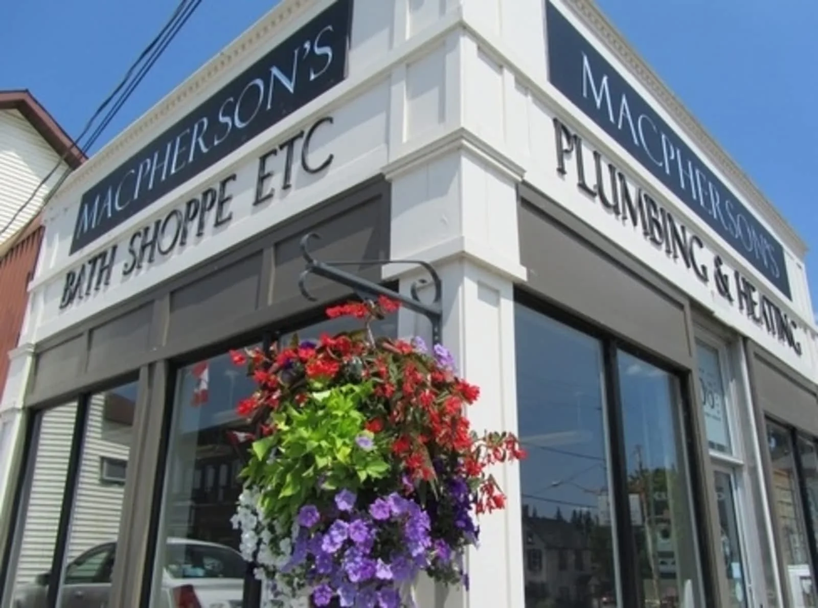 The MacPherson's Plumbing & Heating and Bath Shoppe storefront at Daniel and Elgin